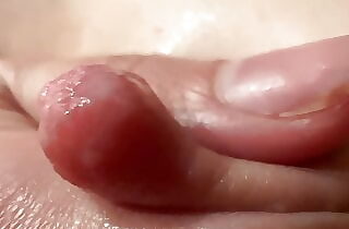 Female breast milk and nipple close up